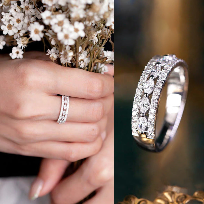 Close-up of the Ophelia Hollow-Out Band Ring, showcasing its intricate hollow-out design and elegant band.