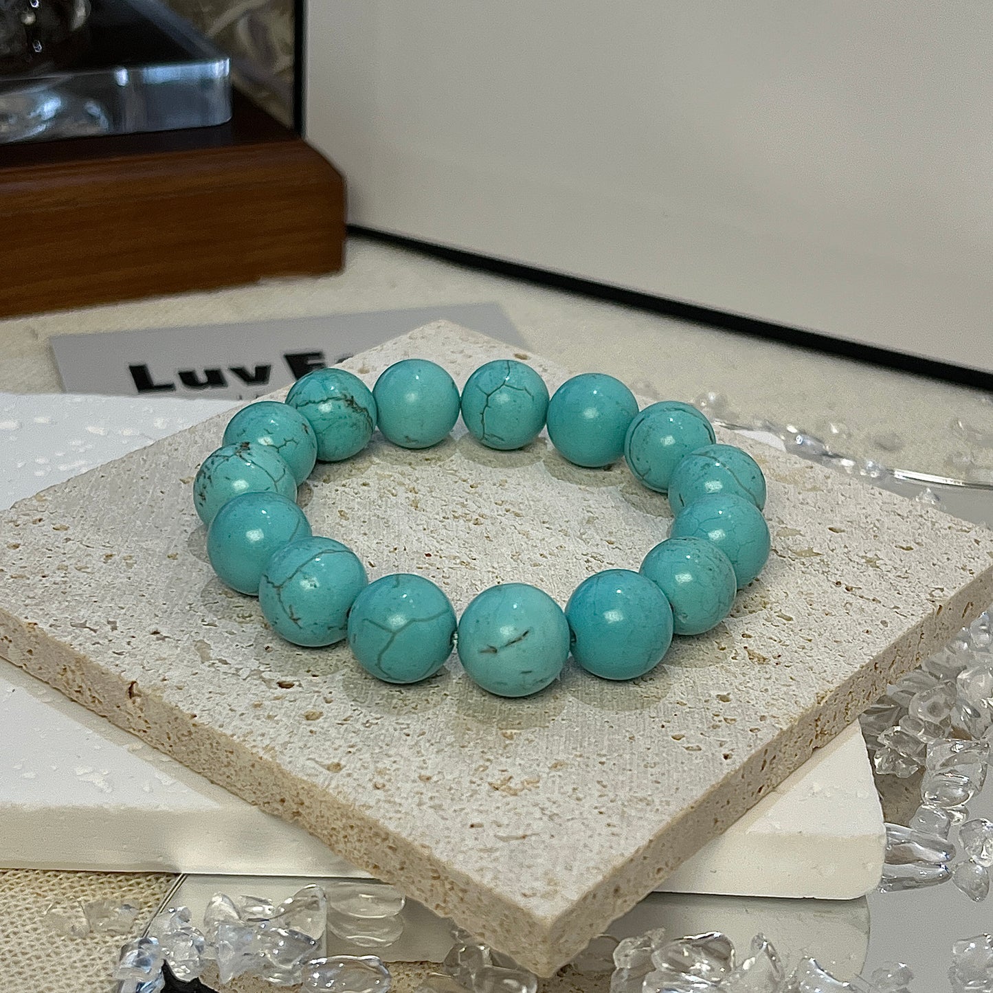 Majestic Tranquility Bracelet from LuvEcho Jewelry with 12mm Turquoise beads offering protection, serenity, and emotional well-being