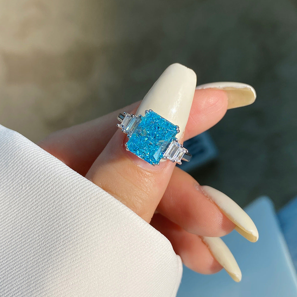 Model Showcasing the Radiant Blue Gemstone Alessandra Ring - LuvEcho Jewelry