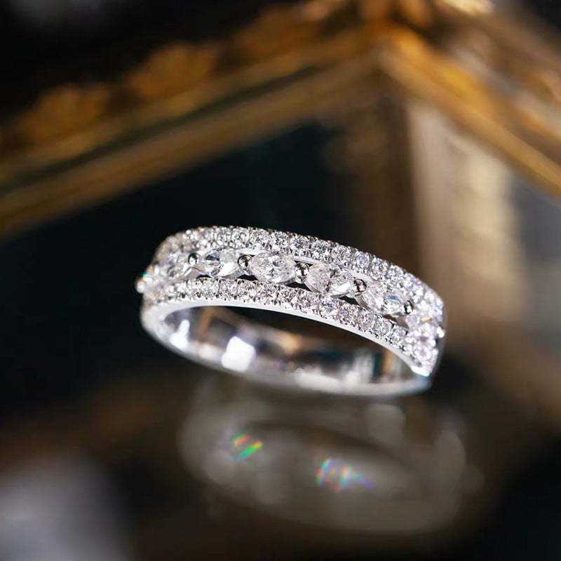 Close-up of the Ophelia Hollow-Out Band Ring, showcasing its intricate hollow-out design and elegant band.