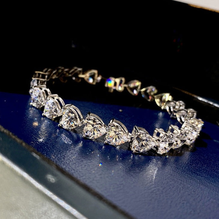 Side view of the elegant Silver Heart Bracelet with sparkling stones