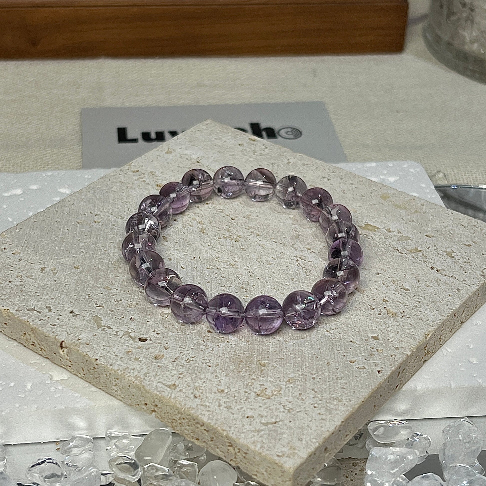 LuvEcho Jewelry’s Serenity Bond Bracelet, featuring soothing Amethyst and powerful Azeztulite beads, perfect for enhancing emotional clarity