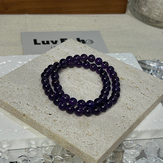 Amethyst Double-Wrap Bracelet by LuvEcho Jewelry with 6mm beads, promoting inner peace, emotional healing, and a calming energy for everyday wear.