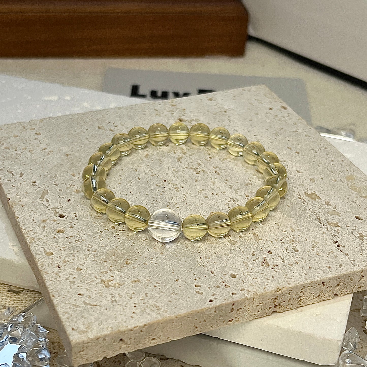 LuvEcho Jewelry Amplified Abundance Bracelet with 6mm Citrine beads and a Crystal Quartz centerpiece, designed to attract prosperity and enhance clarity