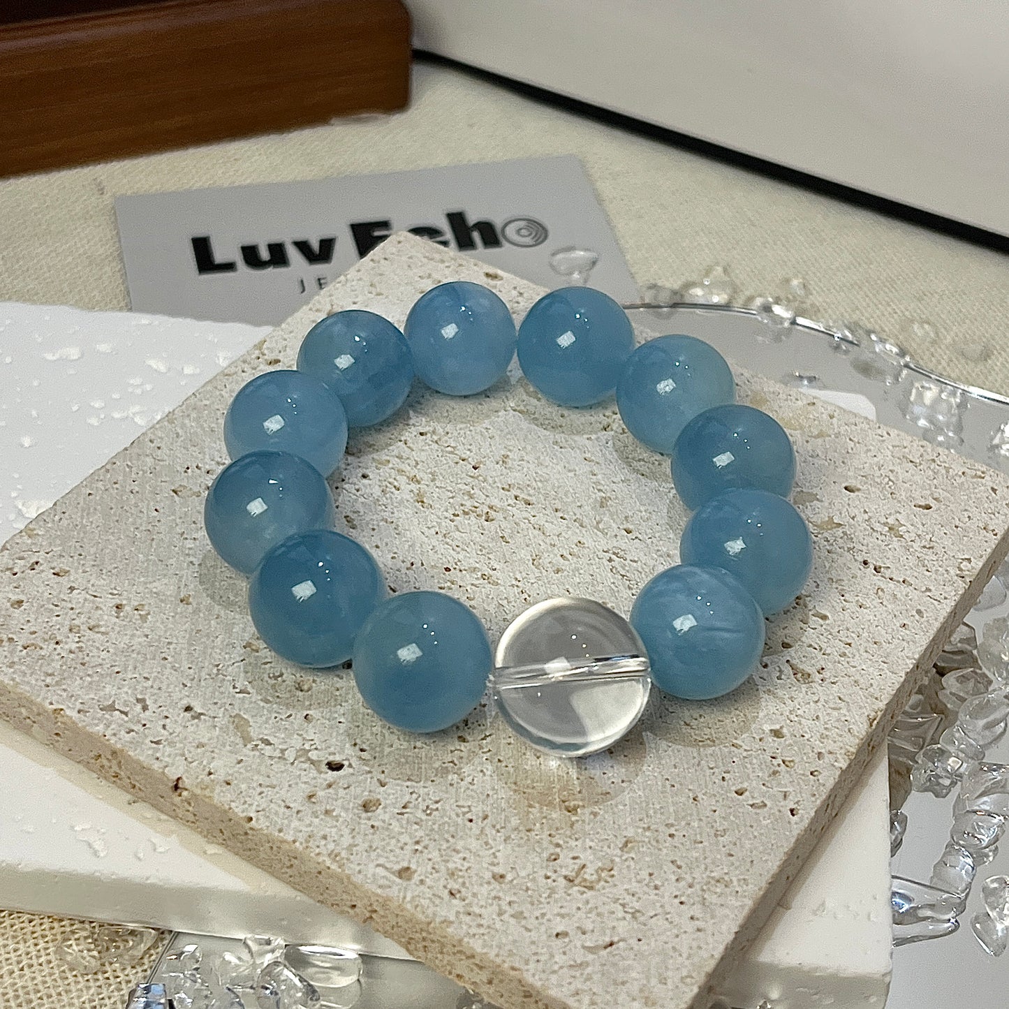 Self-expression and relaxation bracelet with 15mm Aquamarine beads and a 16mm Crystal Quartz bead for clarity.