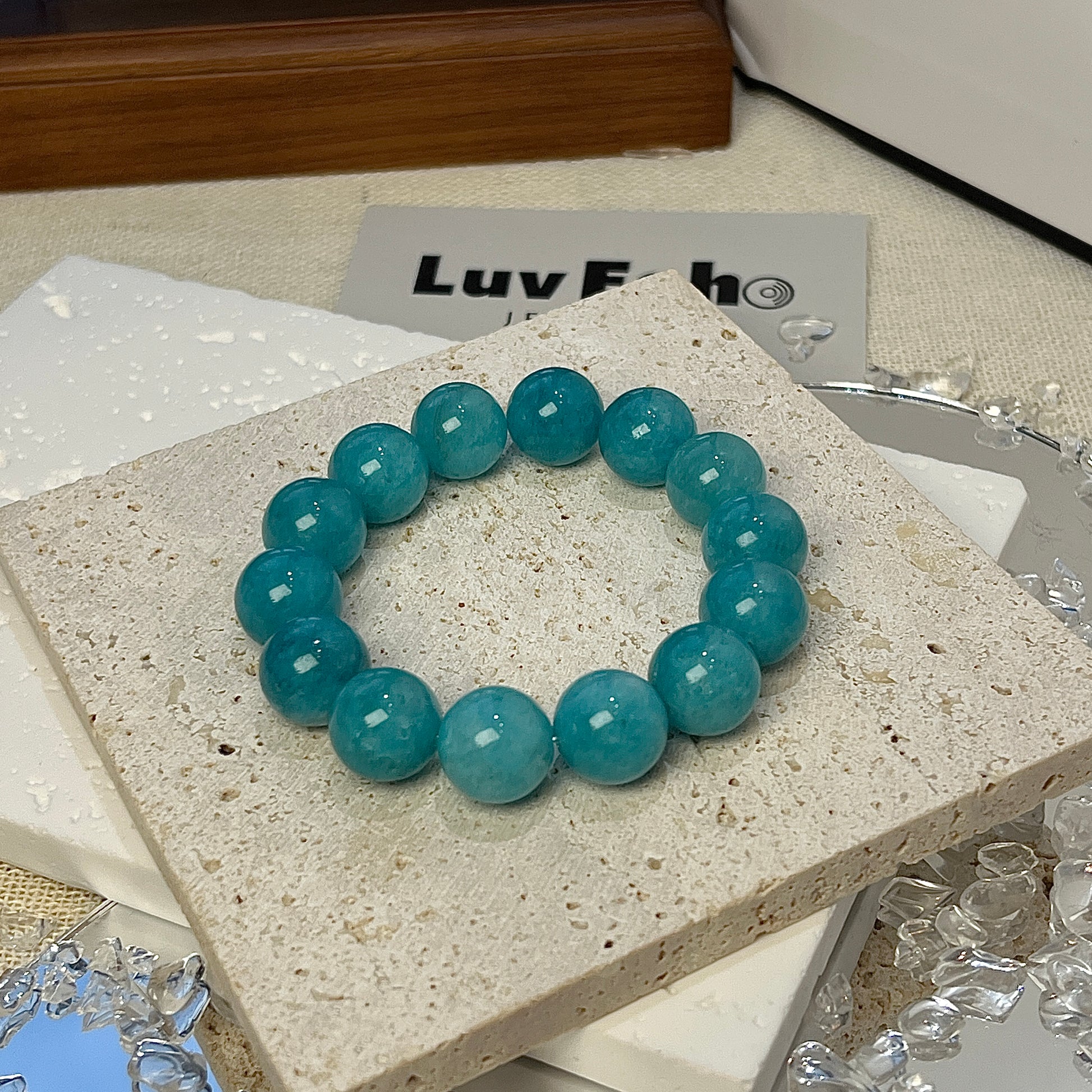 LuvEcho Jewelry Calm Reflection Bracelet featuring elegant 12mm Amazonite beads for soothing energy and improved interpersonal connections