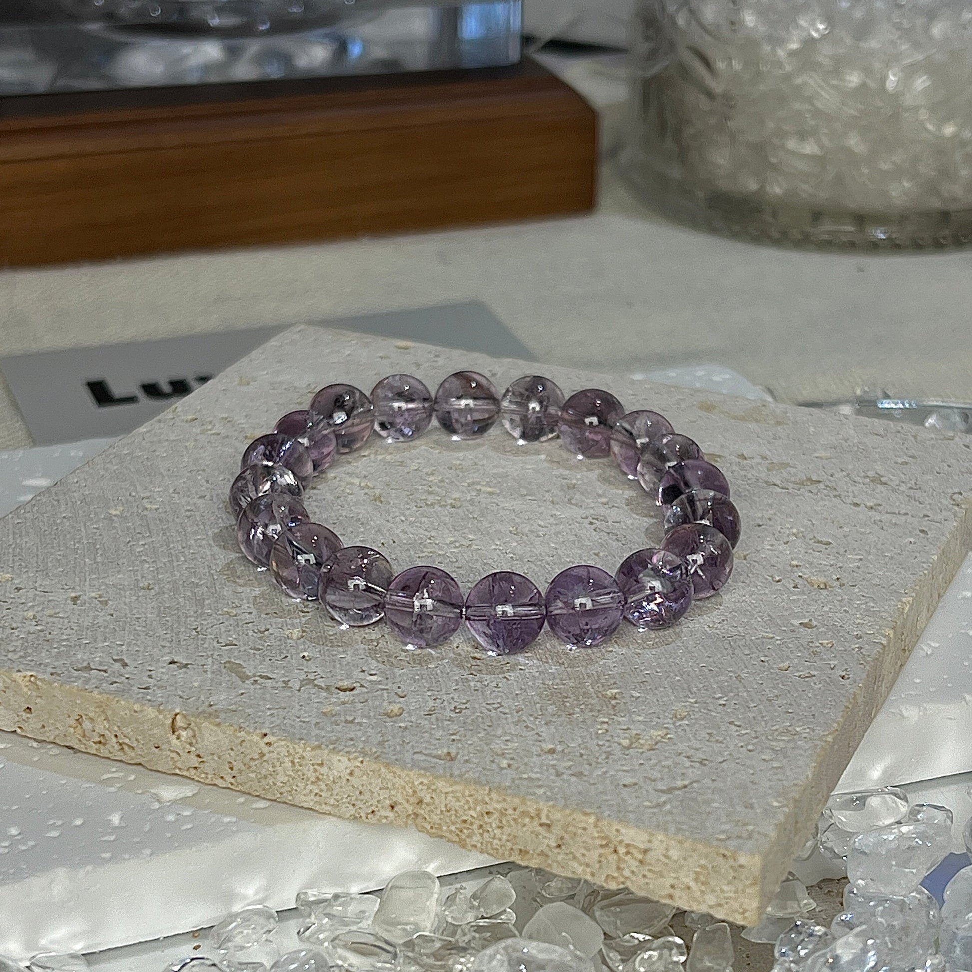 Elegant 8mm Amethyst and Azeztulite bracelet designed to foster inner peace and support emotional well-being from LuvEcho Jewelry