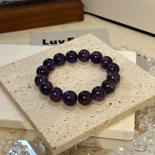 Calming and stress-relieving 10mm Amethyst bracelet, Divine Tranquility design.