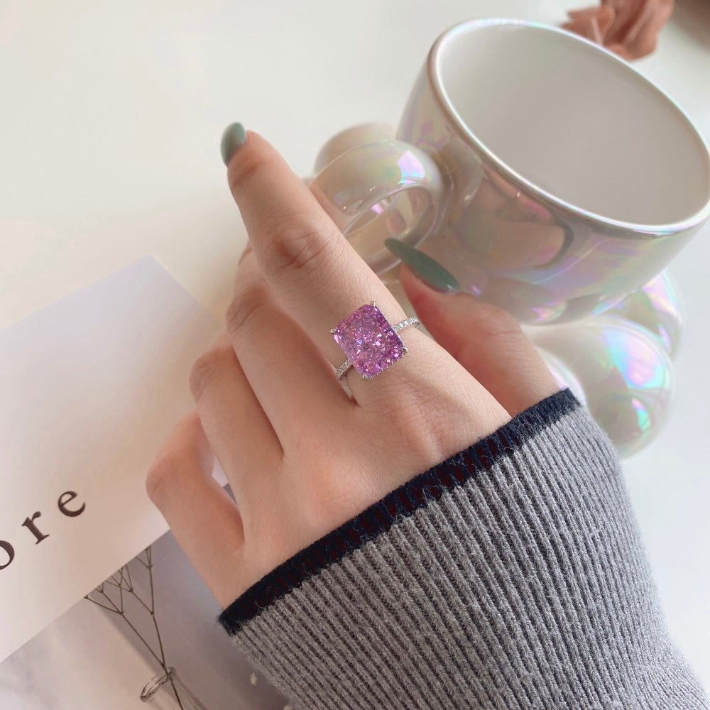 Model showcasing the elegant Kimber Ring with a stunning purple gemstone - LuvEcho Jewelry