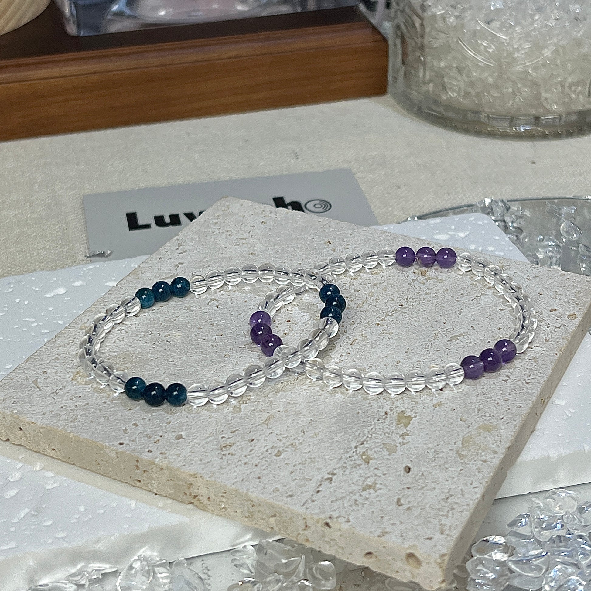 Dual bracelet set from LuvEcho Jewelry, promoting emotional balance with Blue Apatite, Amethyst, and Crystal Quartz.