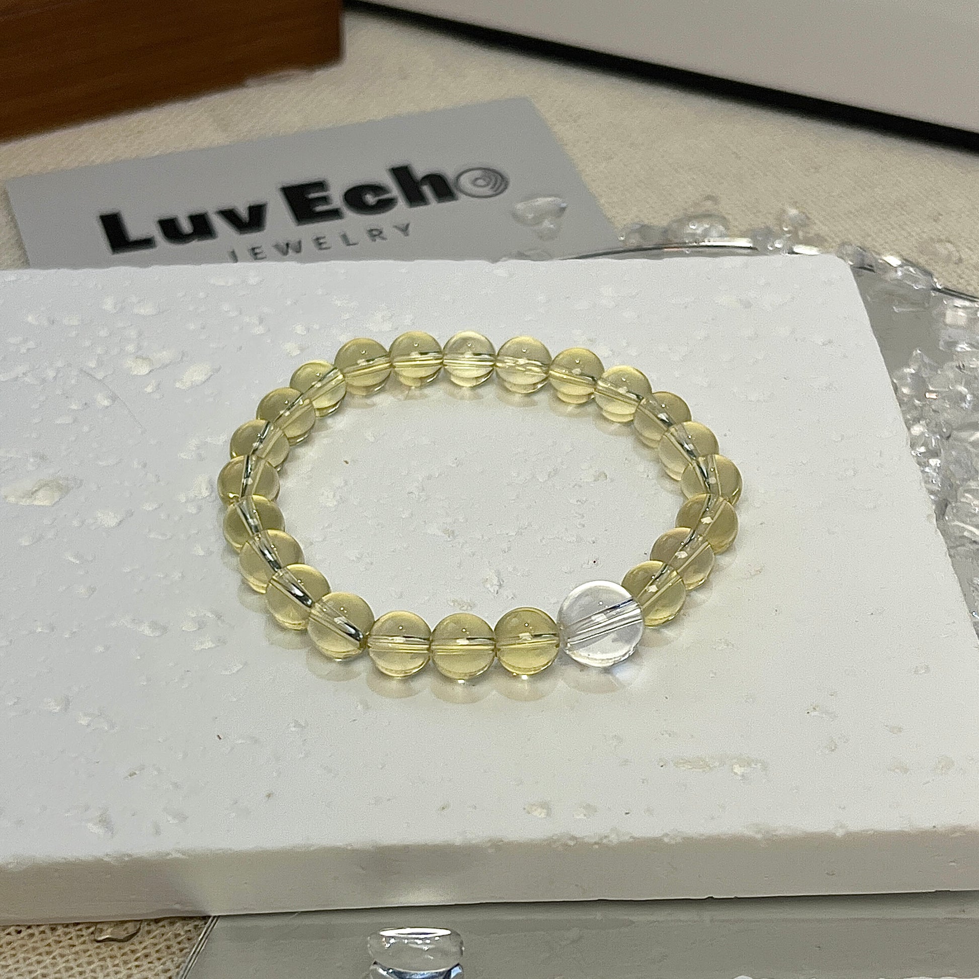 LuvEcho Jewelry Amplified Abundance Bracelet featuring 6mm Citrine beads and a central Crystal Quartz bead for boosting prosperity and focus