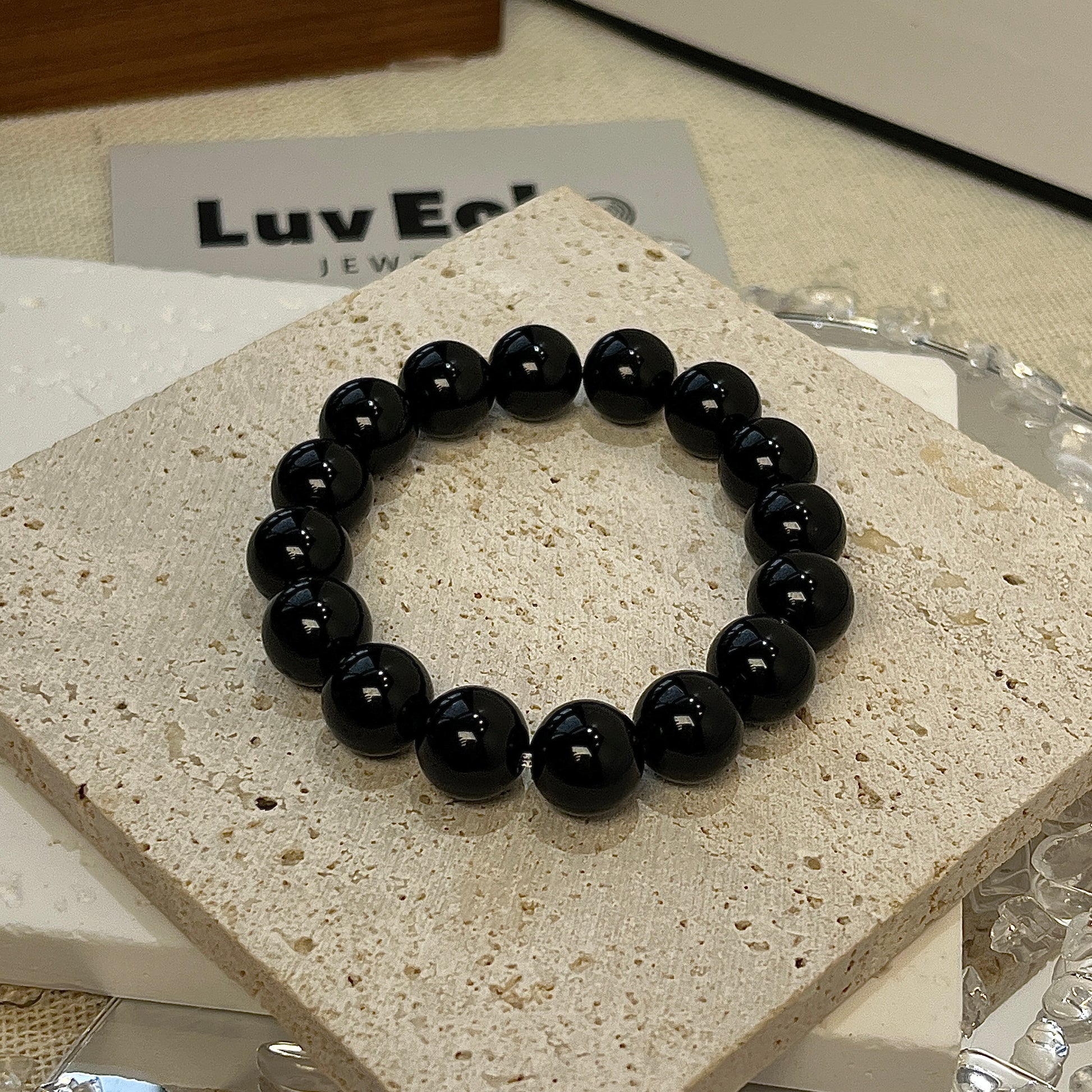 LuvEcho Jewelry Luminous Empowerment Bracelet with 12mm Golden Sheen Obsidian beads, combining beauty and energetic protection