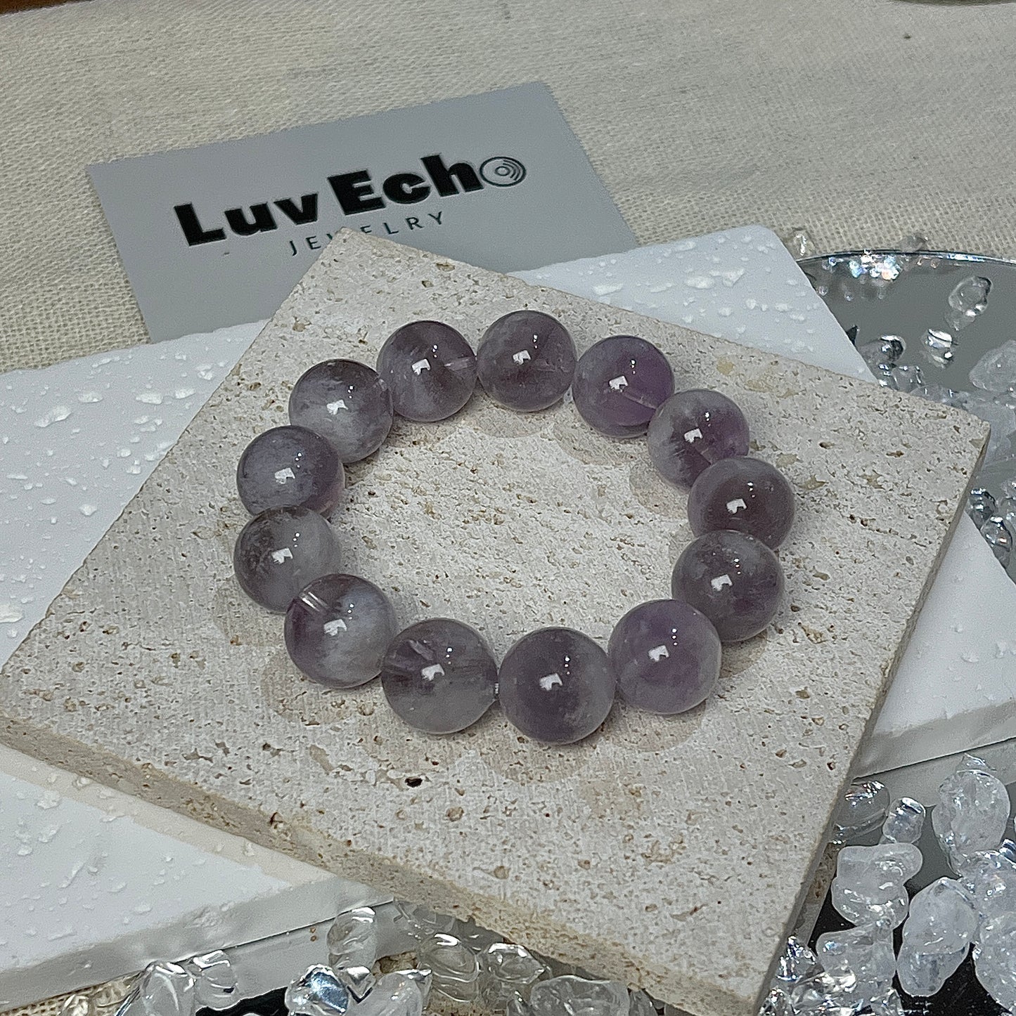 Spiritual balance and clarity with the Lavender Serenity Bracelet, featuring 13mm lavender Amethyst beads.