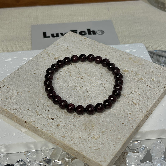 Passion Ignite Bracelet with 6mm Garnet beads, designed to boost confidence and passion from LuvEcho Jewelry.