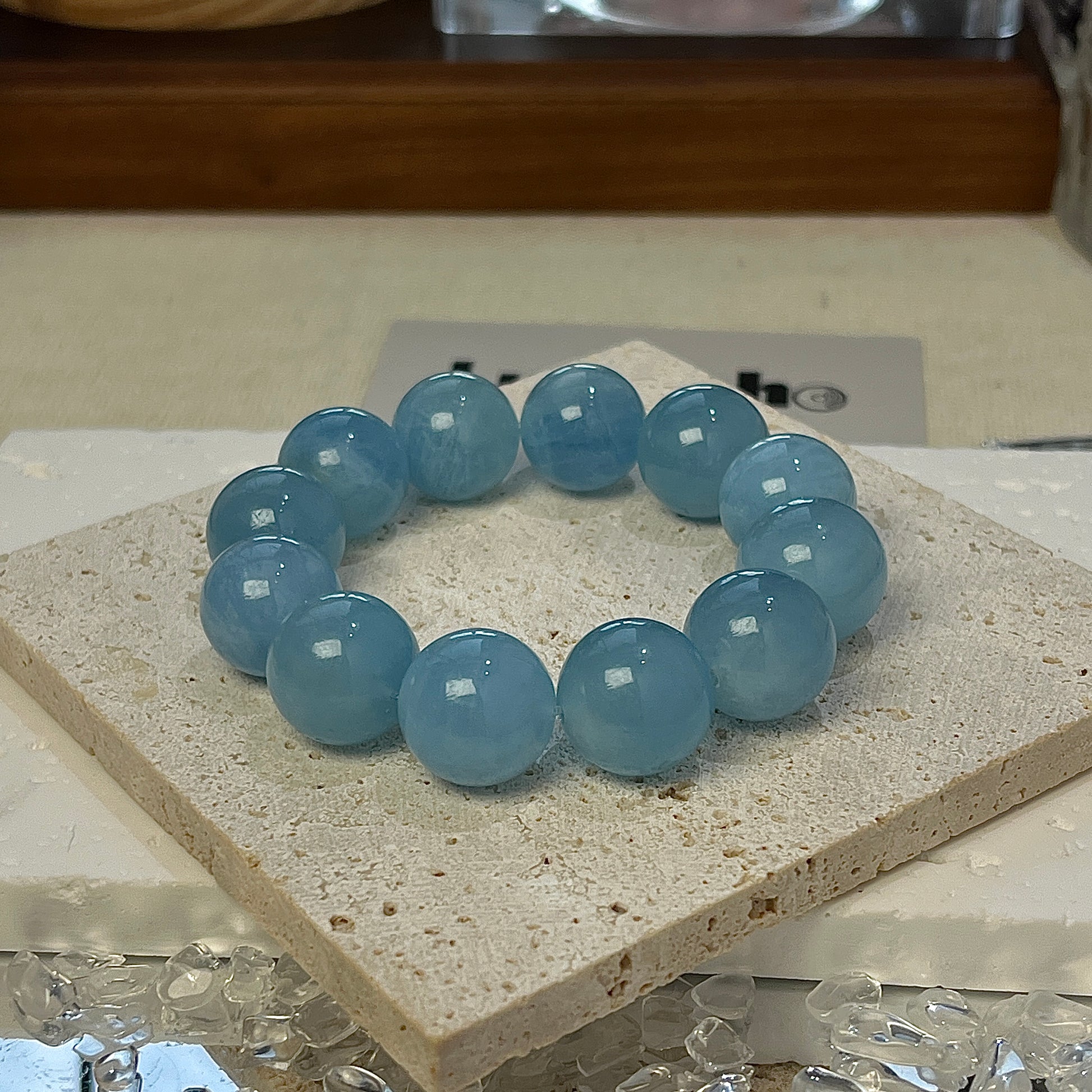 Elegant Aquatic Harmony Bracelet with 15mm Aquamarine beads, supporting emotional balance and peace.