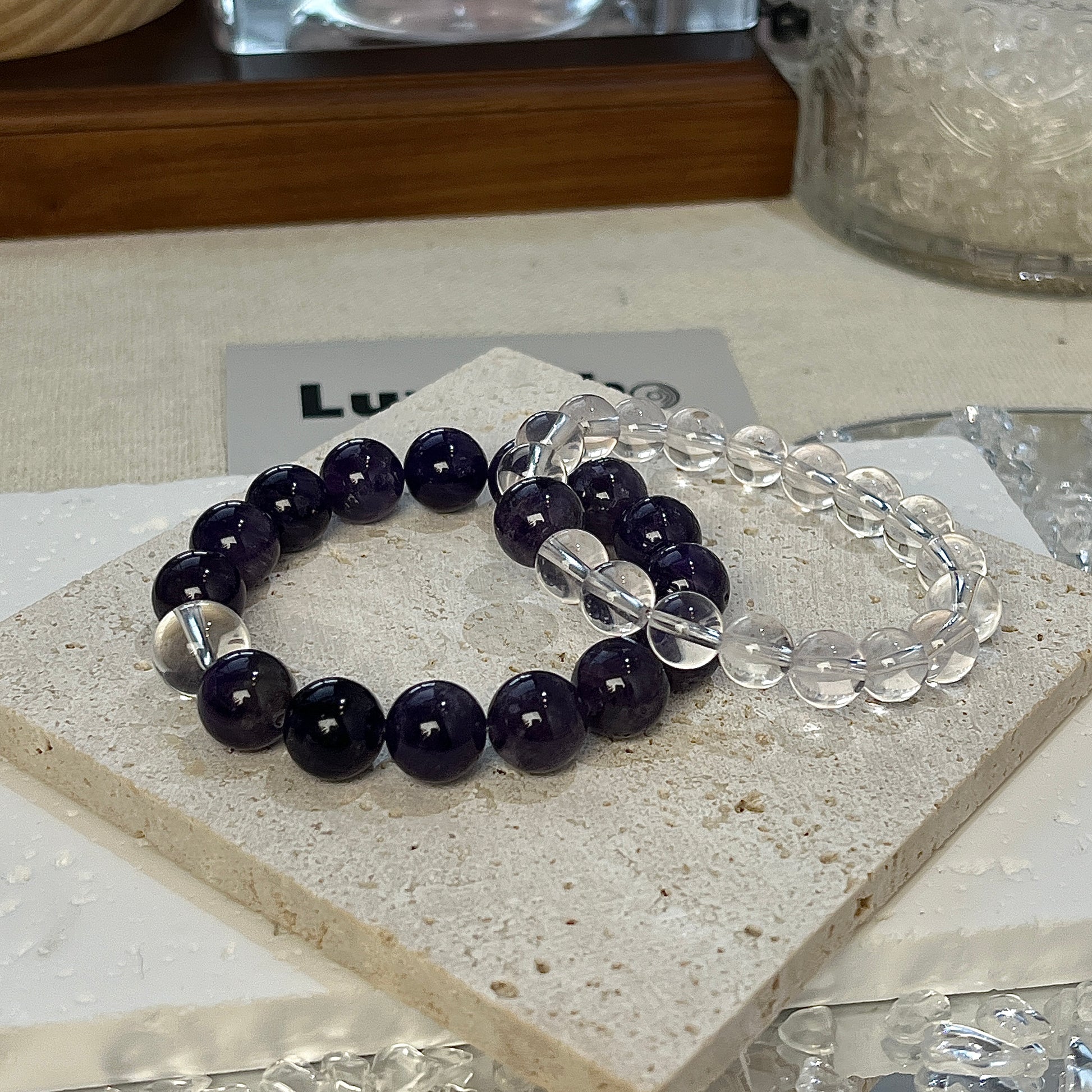 Beautifully crafted set of Amethyst Serenity and Crystal Clarity Bracelets for mindfulness and inner peace.