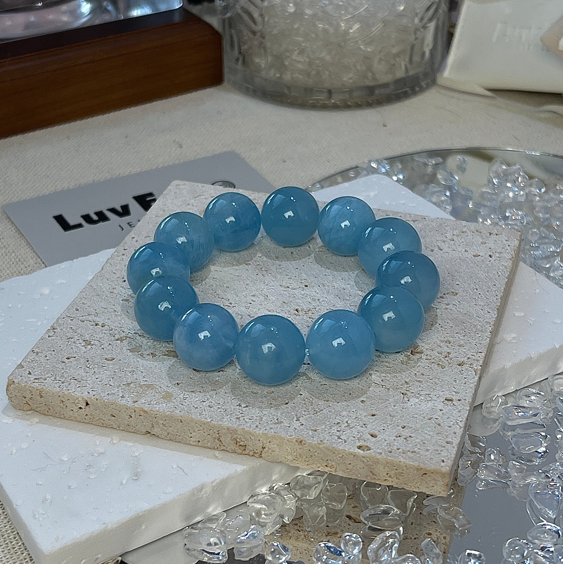 15mm Aquamarine bracelet designed for emotional healing and mindfulness, the Aquatic Harmony Bracelet by LuvEcho Jewelry.