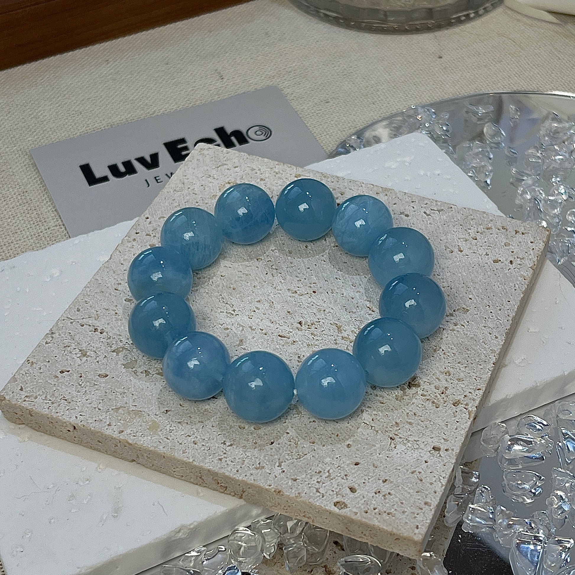 Aquatic Harmony Bracelet by LuvEcho Jewelry, featuring 15mm Aquamarine beads for emotional healing and tranquility.