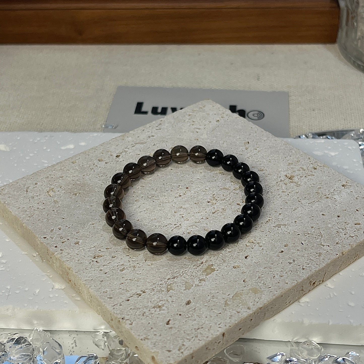 Dual Shield Bracelet featuring 6mm Obsidian and Smoky Quartz beads for protection and emotional clarity.