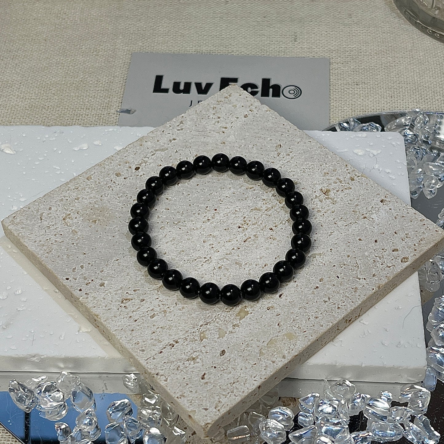 Obsidian Shield Bracelet from LuvEcho Jewelry featuring 6mm Obsidian beads for protection and grounding.