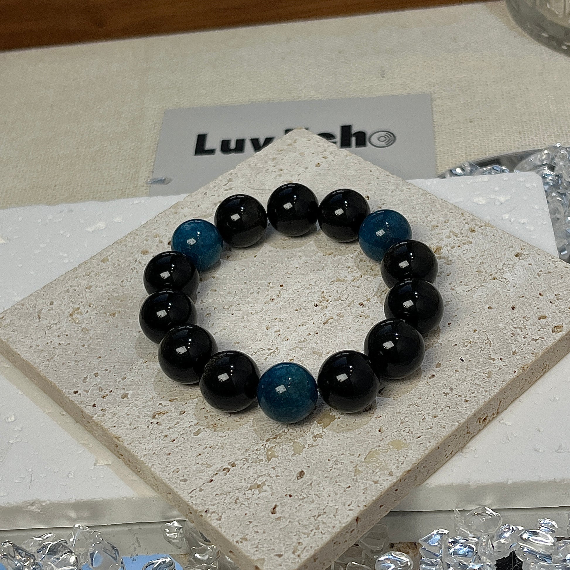 Beautifully crafted bracelet combining Golden Obsidian and Blue Apatite for grounding energy and personal growth.