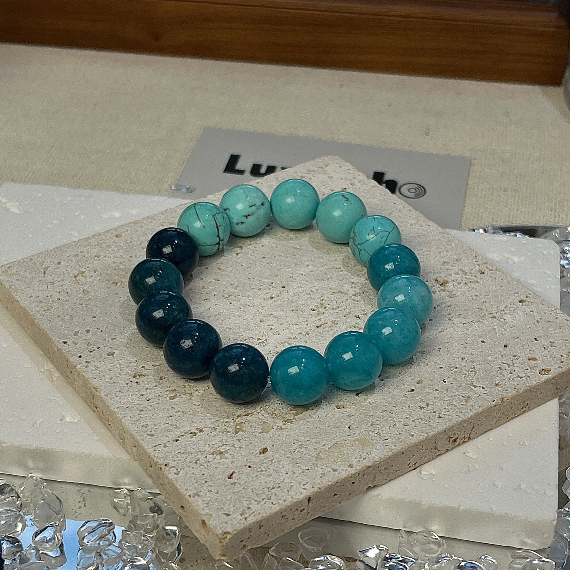 Bracelet with 12mm Turquoise, Blue Apatite, and Amazonite designed to promote emotional healing and communication.