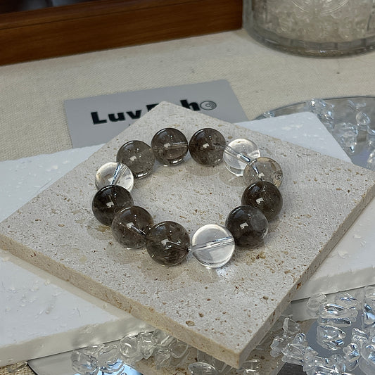 Elegant LuvEcho Jewelry combination of Smoky Azeztulite and Crystal Quartz, ideal for enhancing emotional well-being.