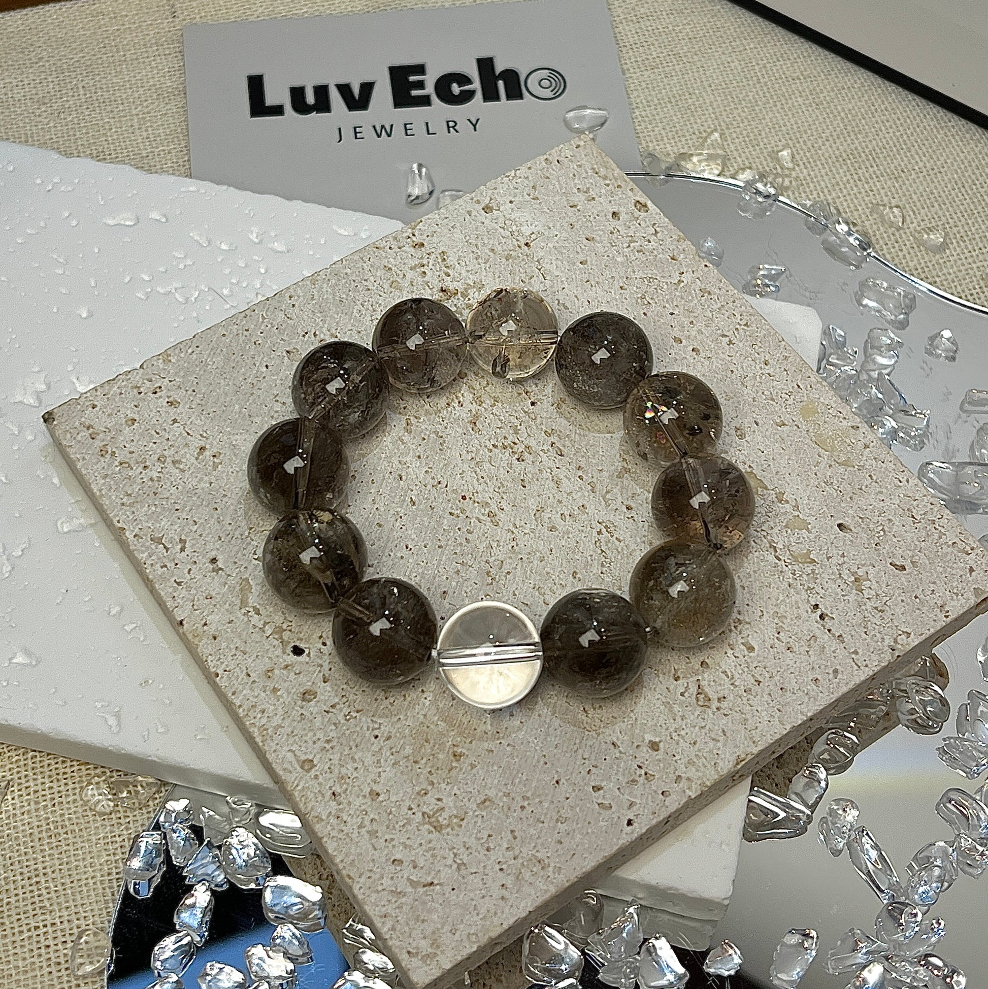 Clarity & Grounding Bracelet by LuvEcho Jewelry featuring 14mm Smoky Azeztulite and Crystal Quartz beads.