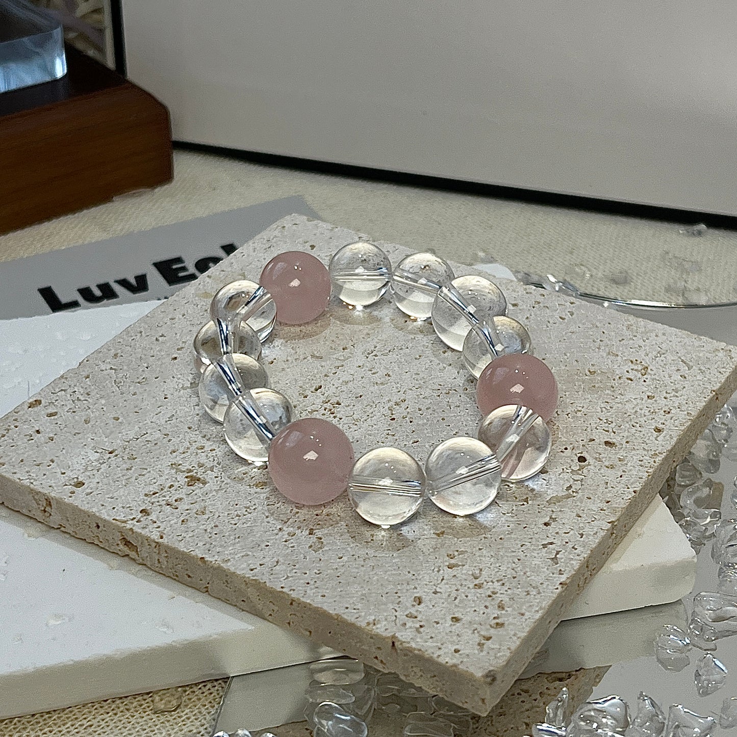 Love & Clarity Bracelet featuring 13mm Rose Quartz and Crystal Quartz beads, designed to promote emotional clarity, self-love, and peaceful energy flow from LuvEcho Jewelry.