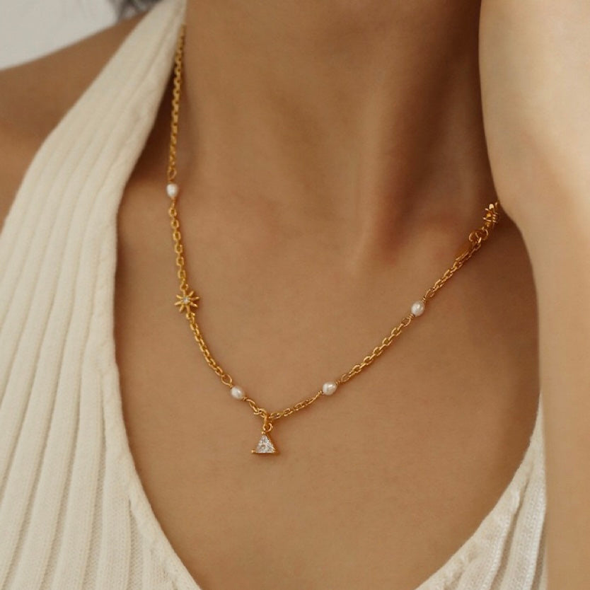 Elegant Pearl Pendant Necklace - An image showcasing the exquisite pearl pendant, carefully crafted in a six-point star design, paired with a high-quality chain for a luxurious look.