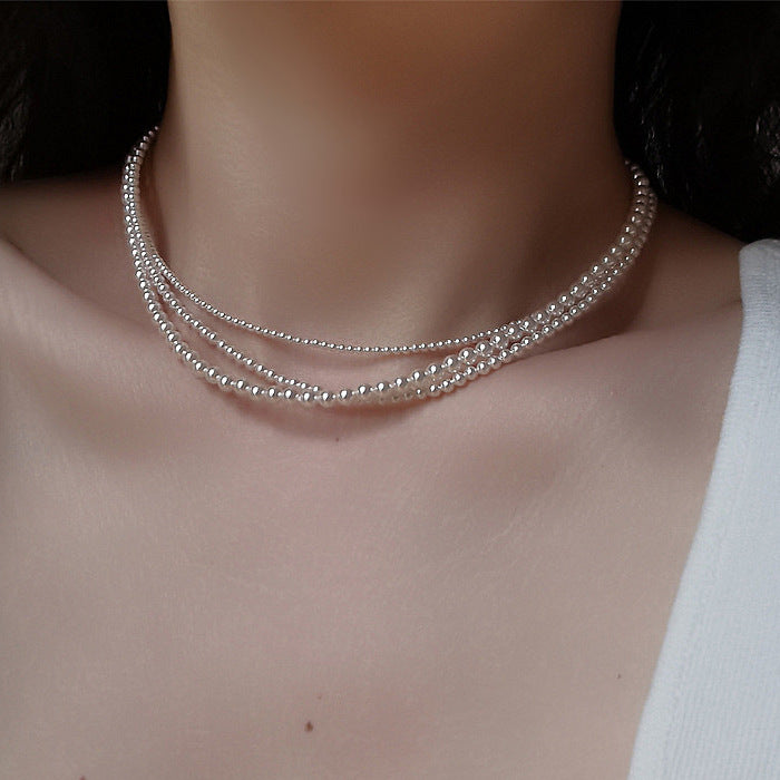 Detail of Claire Elegant White Pearl Necklace - Sophisticated Pearl Design - Pearl Sizes 3mm-10mm